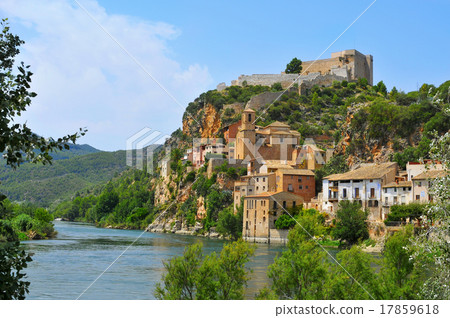 the Ebro River and the old town of Miravet, Spain 17859618
