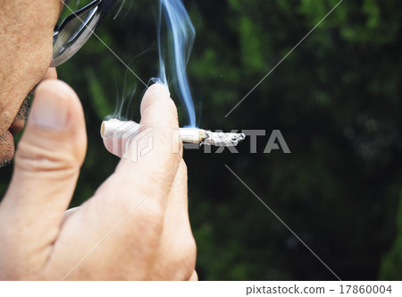 Image of men smoking cigarettes Image of men smoking cigarettes 17860004