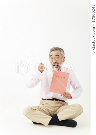 A senior male with a guts pose with a pension notebook scratching his cedar A senior male with a guts pose with a pension notebook scratching his cedar 17860243