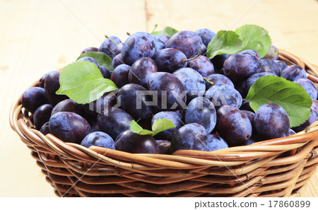 Basket of fresh plums Basket of fresh plums 17860899