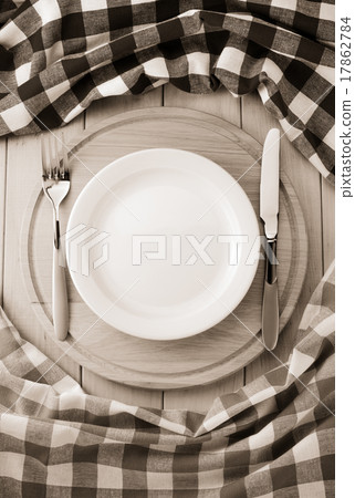 plate, knife and fork at cutting board plate, knife and fork at cutting board 17862784