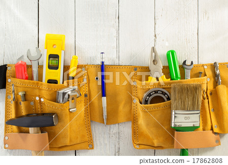 tools and instruments in belt on wood 17862808