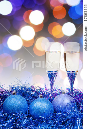 glasses, blue Xmass balls on blurry background 10 glasses, blue Xmass balls on blurry background 10 17865363