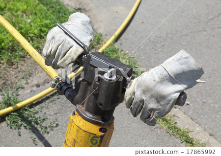 Jackhammer and protective gloves 17865992