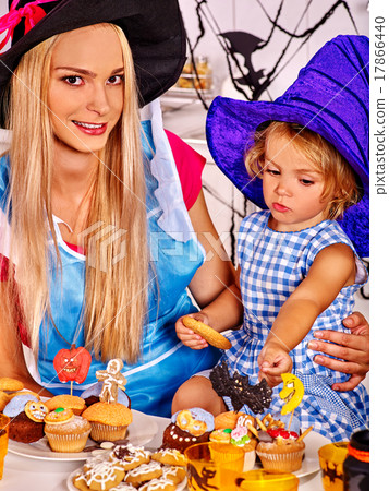 Family preparing halloween food. 17866440