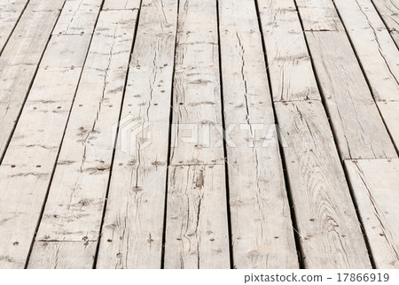 Cracked weathered wood deck boards Cracked weathered wood deck boards 17866919