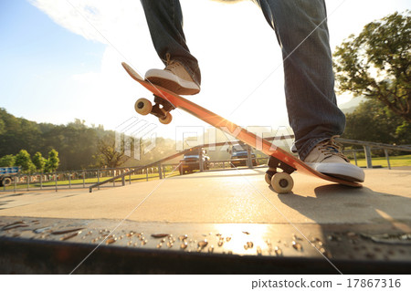 skateboarder legs skateboarding at skatepark ramp 17867316