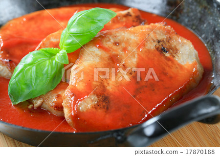 Pork chops with tomato sauce 17870188