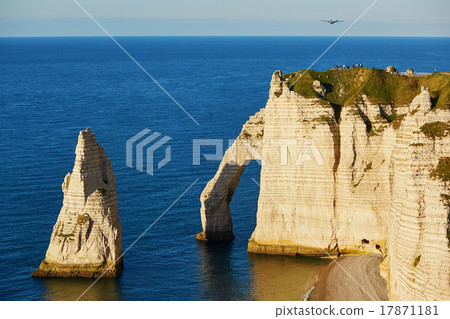 Scenic view of Etretat cliffs with plane 17871181