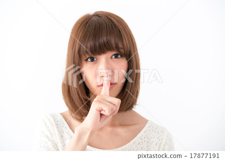 A young woman who makes a secret pose 17877191