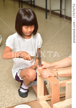 Girls enjoying woodworking 17879752