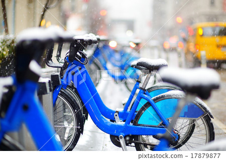 Rental city bikes covered with snow in New York Rental city bikes covered with snow in New York 17879877