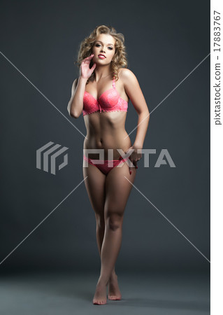 Smiling blonde posing in pink bra and panties 17883767