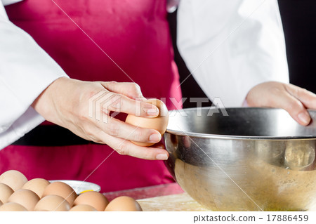 cracking an egg cracking an egg 17886459