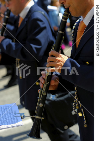 musician playing clarinet during the patron feast musician playing clarinet during the patron feast 17890484