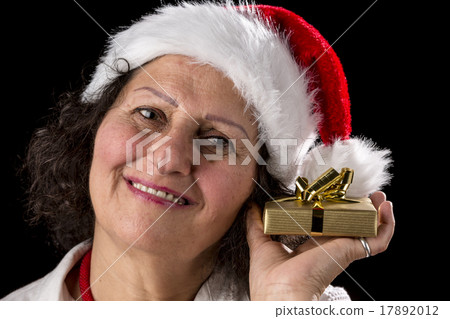 Middle-Aged Woman Holding Golden Gift 17892012