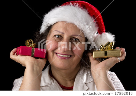 Gentle Aged Woman Holging Two Small Gifts 17892013
