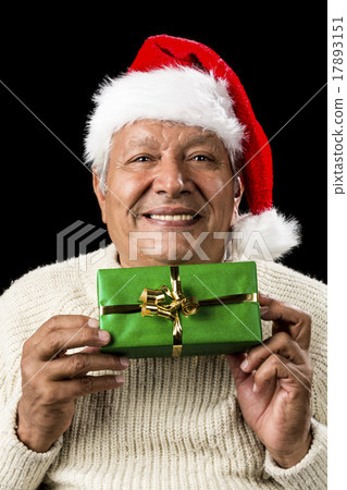 Smiling Old Man Handing Over A Wrapped Green Gift 17893151