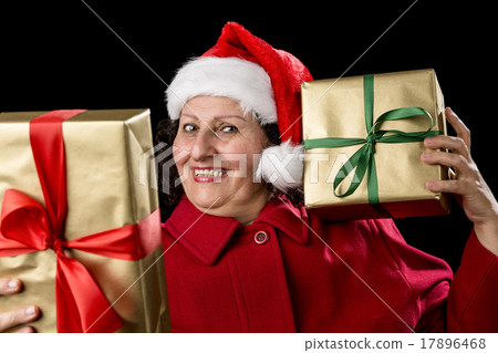 Happy Old Lady in Red with Wrapped Golden Gifts. 17896468