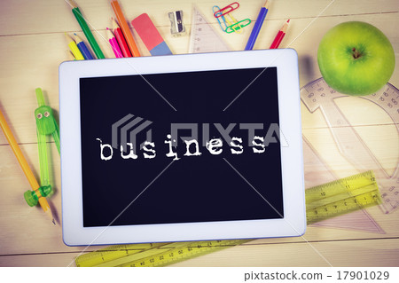 Business against students table with school supplies 17901029