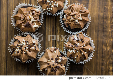 Chocolate cupcakes on a table Chocolate cupcakes on a table 17901292