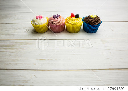 Delicious cupcakes on a table 17901891