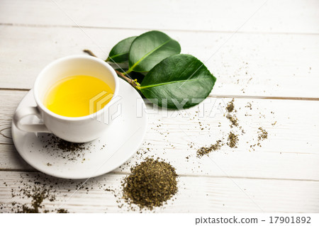 Cup of herbal tea on table Cup of herbal tea on table 17901892