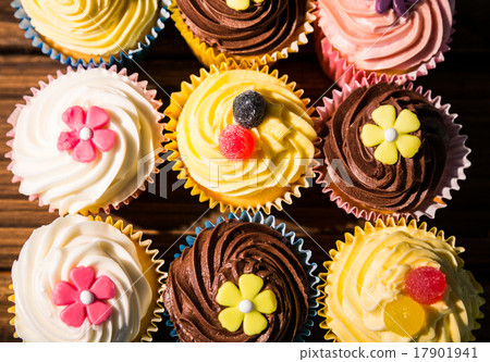 Delicious cupcakes on a table Delicious cupcakes on a table 17901941