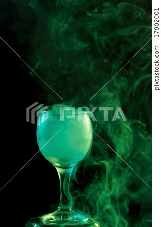 Green smoke in the glass. Halloween. Green smoke in the glass. Halloween. 17902001