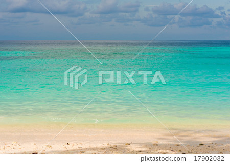 Blue sky with beach and tropical sea Blue sky with beach and tropical sea 17902082