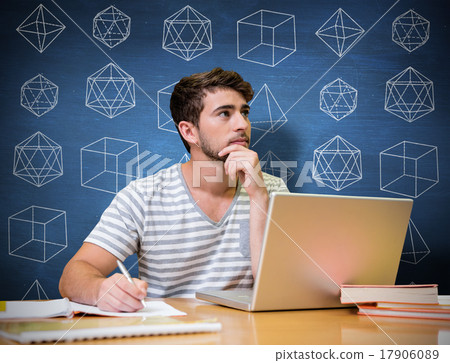 Composite image of student studying in the library with laptop Composite image of student studying in the library with laptop 17906089
