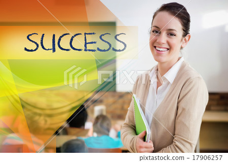 Success against pretty teacher smiling at camera at back of clas 17906257