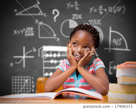 Composite image of pupil sitting at her desk Composite image of pupil sitting at her desk 17906351