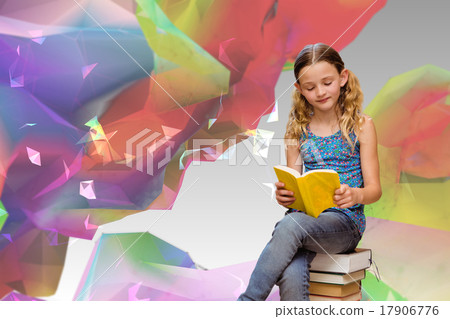 Composite image of cute little girl reading book in library Composite image of cute little girl reading book in library 17906776