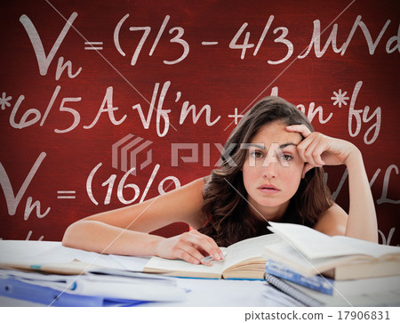 Composite image of bored student doing her homework Composite image of bored student doing her homework 17906831