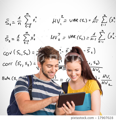 Composite image of happy students using tablet pc Composite image of happy students using tablet pc 17907028