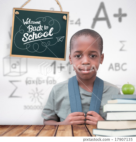 Composite image of cute pupil smiling at camera 17907135