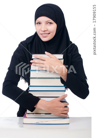 Young muslim female student with books Young muslim female student with books 17909155