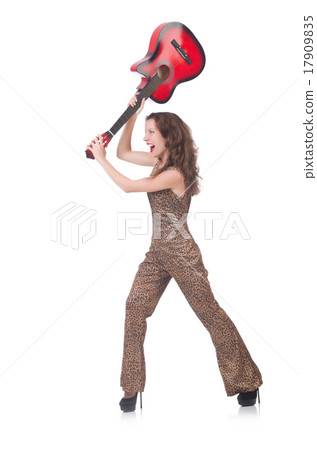 Woman in leopard clothing on white with guitar 17909835