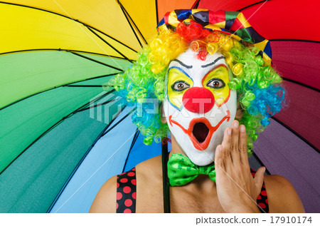 Clown with umbrella isolated on white Clown with umbrella isolated on white 17910174
