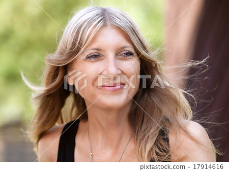Portrait of a Middle-aged Woman with Blond Hair Portrait of a Middle-aged Woman with Blond Hair 17914616