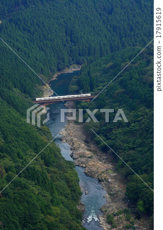 221 series train crossing the Hozu River 17915619