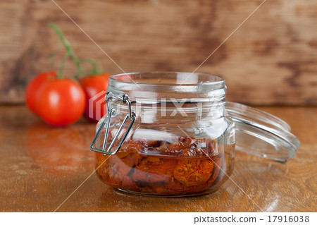 Dried tomatoes in a jar 17916038