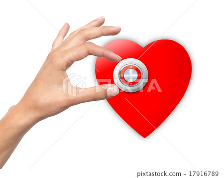 Woman hand opens locked heart Woman hand opens locked heart 17916789