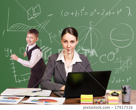 Teacher sitting at the desk 17917316