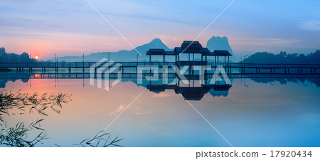 Bridge and pavilion on lake at sunrise park. Burma Bridge and pavilion on lake at sunrise park. Burma 17920434