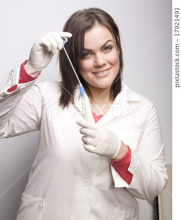 young pretty brunette woman doctor taking analyzes 17921491