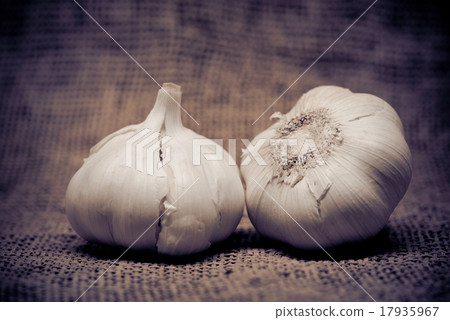 Garlic close up. Color tone tuned photo Garlic close up. Color tone tuned photo 17935967