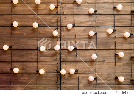 Wood wall with edison light bulb 17936454