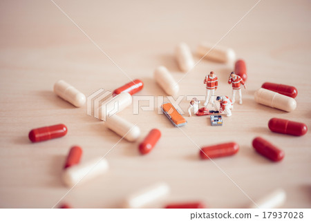 Paramedics giving first-aid to injured person 17937028